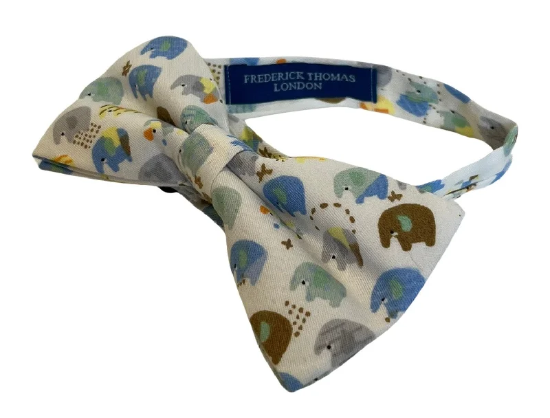 trendy tie patterns for men-Ivory cotton child's bow tie with colourful  elephants design